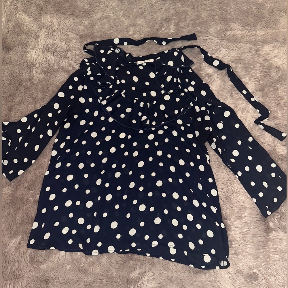 Navy and white polka dot blouse